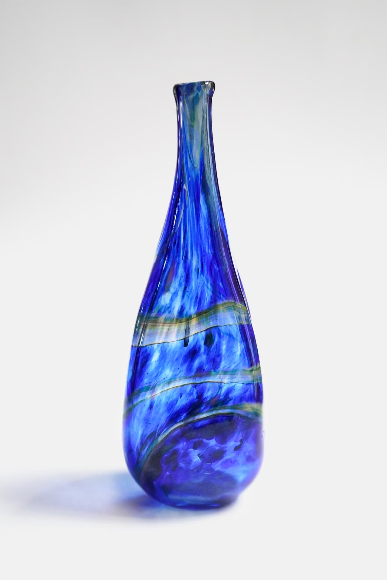 Hand-blown blue arc vase by Zach Glassman